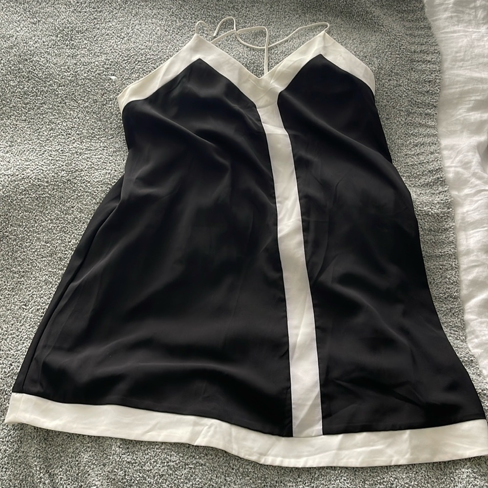 Tags still on black and white dress
